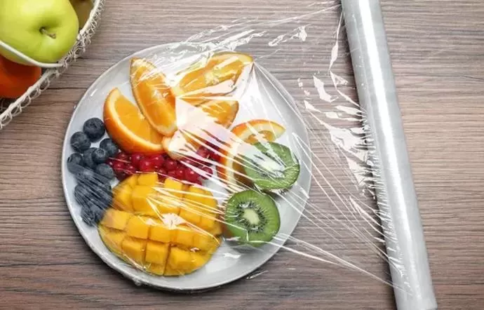 Three-Ripe-Tomatoes-Plastic-Wrapped-on-Table.jpg Three-Ripe-Tomatoes-Plastic-Wrapped-on-Table.jpg